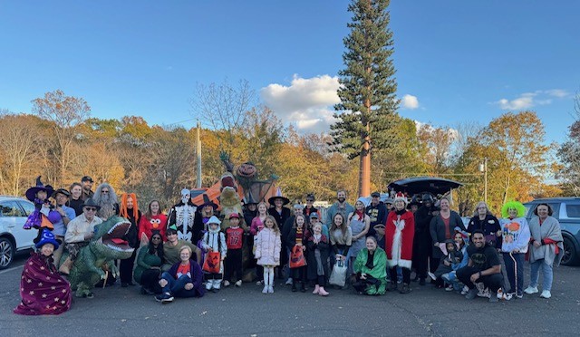 Large group in costumes at the Trunk 'n Treat event