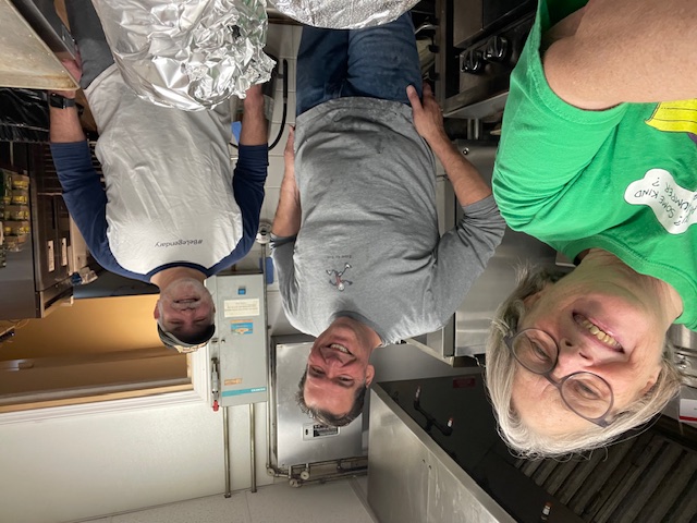 Cheshire UMC volunteers serving in the church kitchen