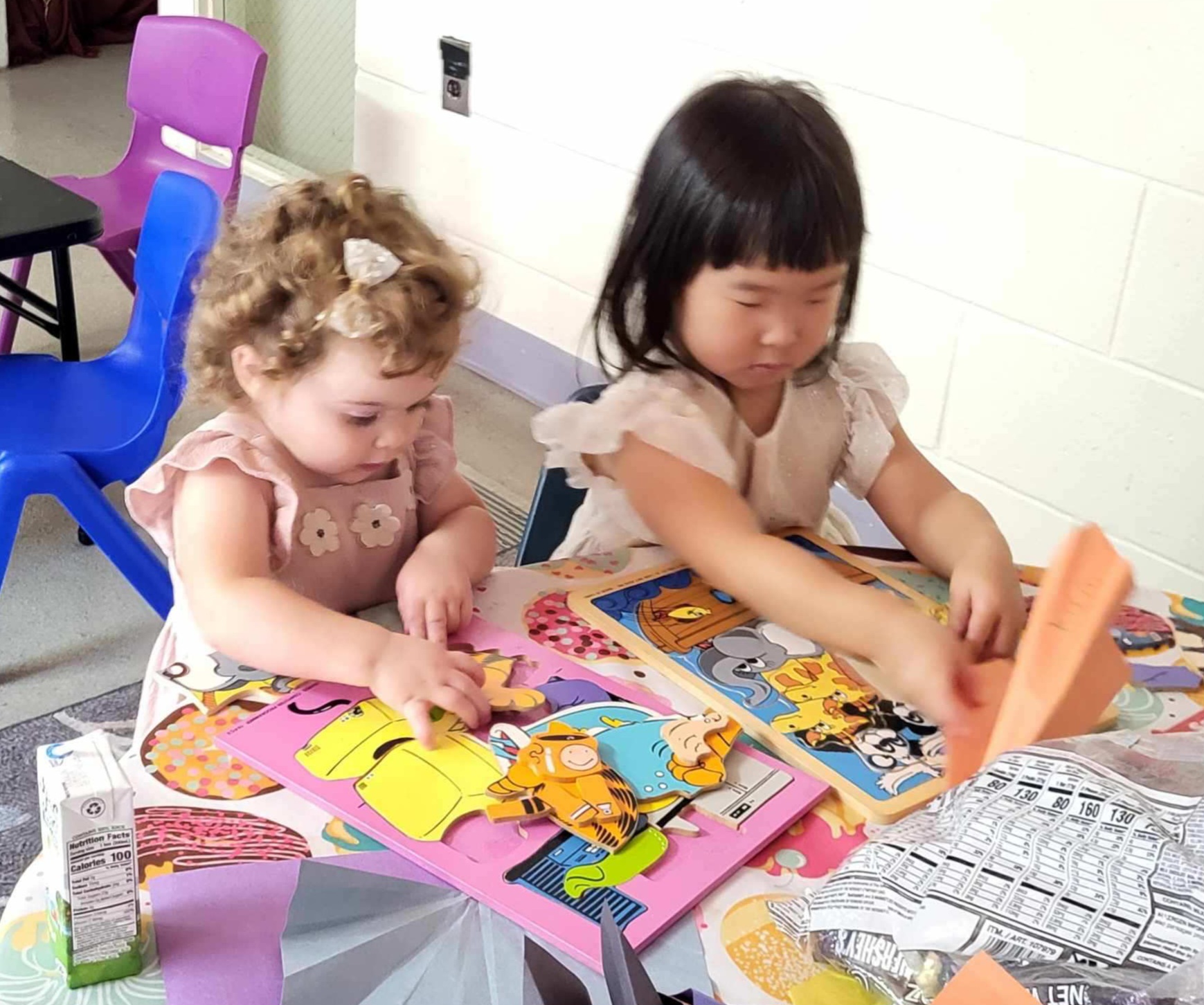 Children working on puzzles in a Sunday School classroom
